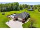 Spacious backyard features a private pool and manicured landscaping, surrounded by lush greenery and a large driveway at 3003 Eaker Dr, Cherryville, NC 28021