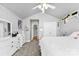 Bright bedroom with a white dresser, ceiling fan, and neutral carpet at 3003 Eaker Dr, Cherryville, NC 28021