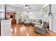 Cozy living room with hardwood floors, a fireplace, and ample seating offers a comfortable space for Gathering gatherings and relaxation at 3003 Eaker Dr, Cherryville, NC 28021
