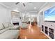 Bright and spacious living room featuring a fireplace, hardwood floors, and neutral décor, perfect for relaxation and entertaining at 3003 Eaker Dr, Cherryville, NC 28021