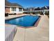 Inviting in-ground pool with a well-maintained patio, perfect for summer relaxation at 3003 Eaker Dr, Cherryville, NC 28021