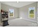 Bright bedroom offering ample light, perfect for creating a serene and productive space at 3013 Isle Ln, Monroe, NC 28110