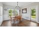 The dining room is a bright space with great natural light and views of the lawn at 3013 Isle Ln, Monroe, NC 28110
