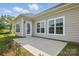 Enjoy outdoor living on this concrete patio with ample space, perfect for relaxing or entertaining at 3013 Isle Ln, Monroe, NC 28110