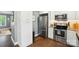 Well-lit kitchen showcases granite countertops and stainless steel appliances at 303 Caroline Ave, Lowell, NC 28098