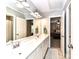 Bathroom features a double vanity with bright lighting, and a doorway leading to the main bedroom at 3057 Drummond Ave, Indian Land, SC 29707