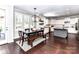 Bright dining room with backyard access is connected to a modern kitchen at 3057 Drummond Ave, Indian Land, SC 29707
