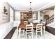 Elegant dining room featuring wainscoting, a chandelier, and a large wooden table at 3057 Drummond Ave, Indian Land, SC 29707