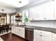 Bright kitchen features stainless steel appliances, granite countertops and eat-in area with natural light at 3057 Drummond Ave, Indian Land, SC 29707