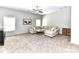 Spacious living room featuring neutral colors, a comfortable sectional, and a stylish coffee table at 3057 Drummond Ave, Indian Land, SC 29707