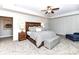 Spacious primary bedroom featuring a king-sized bed, wood accents, and comfortable furnishings at 3057 Drummond Ave, Indian Land, SC 29707
