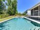 A sparkling backyard pool with an adjacent screened porch offers a perfect blend of indoor-outdoor living at 3057 Drummond Ave, Indian Land, SC 29707