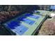 An aerial view showcasing multiple well-maintained tennis courts within a community at 3057 Drummond Ave, Indian Land, SC 29707