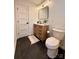 Bathroom featuring a modern vanity with marble countertop and contemporary fixtures at 3317 Sargeant Dr, Charlotte, NC 28217