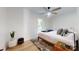 Bedroom features hardwood floors, a ceiling fan, and plenty of natural light at 3317 Sargeant Dr, Charlotte, NC 28217