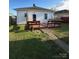 Enjoy this backyard featuring a cozy deck area and well-maintained grass at 36 Maple Ave, Gastonia, NC 28054
