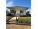 Charming single-Gathering home featuring a welcoming front porch and well-maintained lawn at 36 Maple Ave, Gastonia, NC 28054