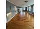 The living room offers hardwood floors and plenty of natural light at 36 Maple Ave, Gastonia, NC 28054