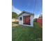 Exterior view of the shed, featuring closed doors and a small window at 36 Maple Ave, Gastonia, NC 28054