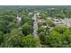 Picturesque aerial view of a tree-lined street with local establishments at 365 Delburg St, Davidson, NC 28036