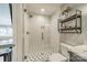 Walk-in shower with subway tile and glass enclosure at 365 Delburg St, Davidson, NC 28036