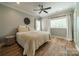 Bright bedroom with hardwood floors and ample natural light at 365 Delburg St, Davidson, NC 28036