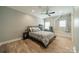 Comfortable bedroom with natural light and ceiling fan at 365 Delburg St, Davidson, NC 28036