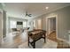 Recreational space with foosball table, comfortable seating, and natural light at 365 Delburg St, Davidson, NC 28036