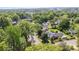 Aerial view of a neighborhood with mature trees and well-kept lawns at 3919 Sarah Dr # 14, Charlotte, NC 28217