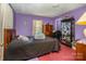 Spacious bedroom with a cozy carpet, and natural light creates a serene and comfortable retreat at 3919 Sarah Dr # 14, Charlotte, NC 28217