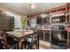 Well-lit eat-in kitchen with black appliances and natural light at 3919 Sarah Dr # 14, Charlotte, NC 28217