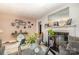 Bright living area with a fireplace, modern decor, and ample natural light at 3919 Sarah Dr # 14, Charlotte, NC 28217