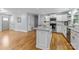 Open-concept kitchen with a granite island, stainless steel appliances, and ample storage, perfect for modern living at 4009 Dunwoody Dr, Charlotte, NC 28215