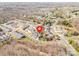 Aerial view of neighborhood homes and streets with a red location pin at 4015 Broadview Ln, Gastonia, NC 28056
