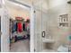 This bathroom features a tiled glass shower and walk-in closet at 4015 Broadview Ln, Gastonia, NC 28056