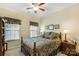 Cozy bedroom with a comfortable bed, neutral walls, and natural light at 4015 Broadview Ln, Gastonia, NC 28056