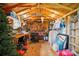 Interior of the shed with organization and storage for tools and other outdoor equipment at 503 Azure Ave, Albemarle, NC 28001