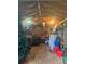 Interior view of backyard shed, featuring a workbench and ample storage at 503 Azure Ave, Albemarle, NC 28001