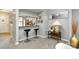 Modern bar counter with seating, overlooking living area with decor and easy access to the kitchen at 513 Lex Dr, Charlotte, NC 28262