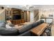 Comfortable living area with a large TV, brick accent wall, and stylish decor at 5301 Meadowcroft Way, Fort Mill, SC 29708