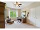 Dedicated office space with a large window, desk, chair, and storage closet at 5301 Meadowcroft Way, Fort Mill, SC 29708