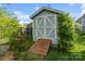 Backyard shed with double doors and a ramp for easy access at 5301 Meadowcroft Way, Fort Mill, SC 29708