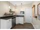 Convenient wet bar area with modern fixtures, cabinetry, and stylish pendant lighting at 5301 Meadowcroft Way, Fort Mill, SC 29708