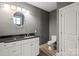 Stylish bathroom featuring granite counters, white cabinets, and modern fixtures at 543 Hampton St, Rock Hill, SC 29730
