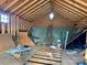 Spacious attic featuring wooden beams and a window providing natural light at 6000 S Main St, Salisbury, NC 28147