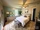 Bright bedroom with a large bed, rug, and natural light at 6000 S Main St, Salisbury, NC 28147