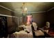 This bedroom features a chandelier, window, and closet for clothing storage at 6000 S Main St, Salisbury, NC 28147