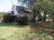 Exterior view of a two-story home with a covered patio at 6000 S Main St, Salisbury, NC 28147