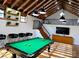 Spacious game room with a billiard table, wet bar, and second floor loft, all under a coffered ceiling at 6000 S Main St, Salisbury, NC 28147