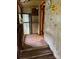 Hallway area with a pet-friendly sign and wood-paneled walls leading to other rooms at 6000 S Main St, Salisbury, NC 28147